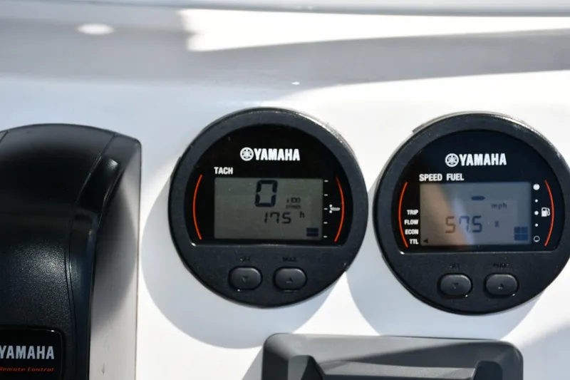 Slide: The Image of Yamaha gauges on 2023 Tidewater 210 LXF boat dashboard, displaying tachometer and speed fuel readings. - 18