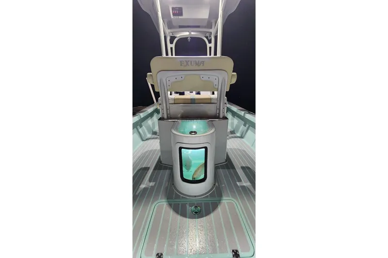 Slide: The Image of 2026 Exuma 22 boat interior with illuminated livewell and seating. - 3