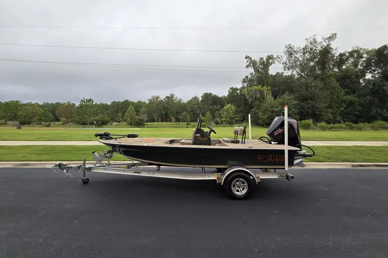 The Image of 2026 Mako 18 Pro Skiff Backwater Edition on trailer, parked outdoors. - 0