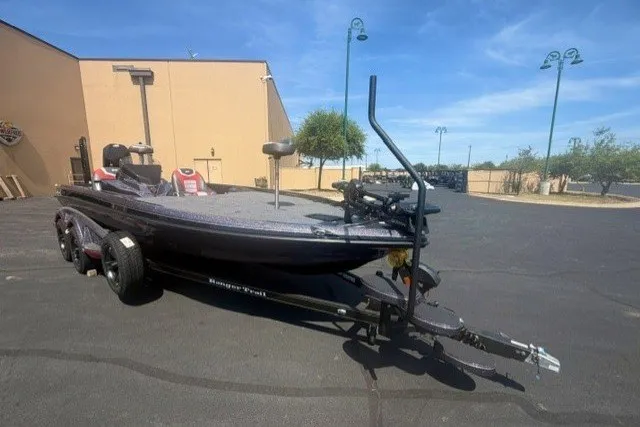 Slide: The Image of 2026 Ranger Z521 boat on trailer in parking lot, sunny day. - 1