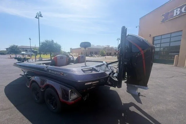 Slide: The Image of 2026 Ranger Z521 boat parked outdoors, showcasing sleek design and powerful engine. - 4