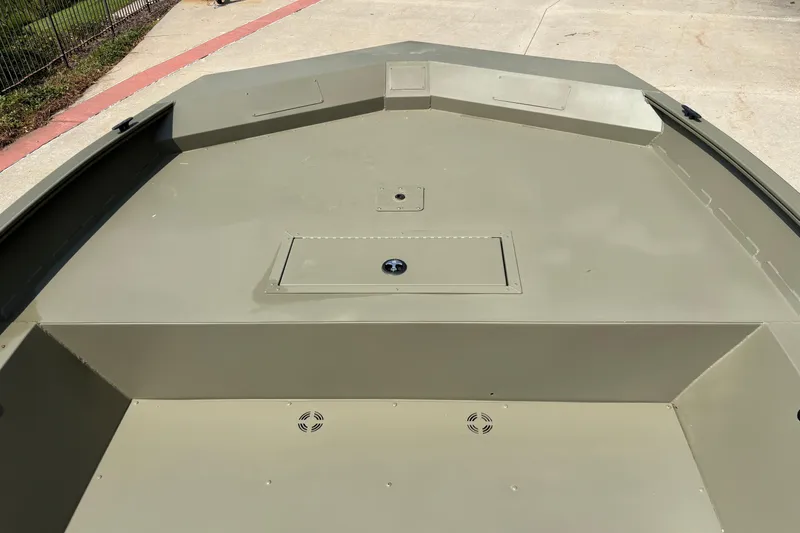 Slide: The Image of 2026 Tracker Grizzly 2072 Utility boat deck, featuring a spacious, durable design. - 4