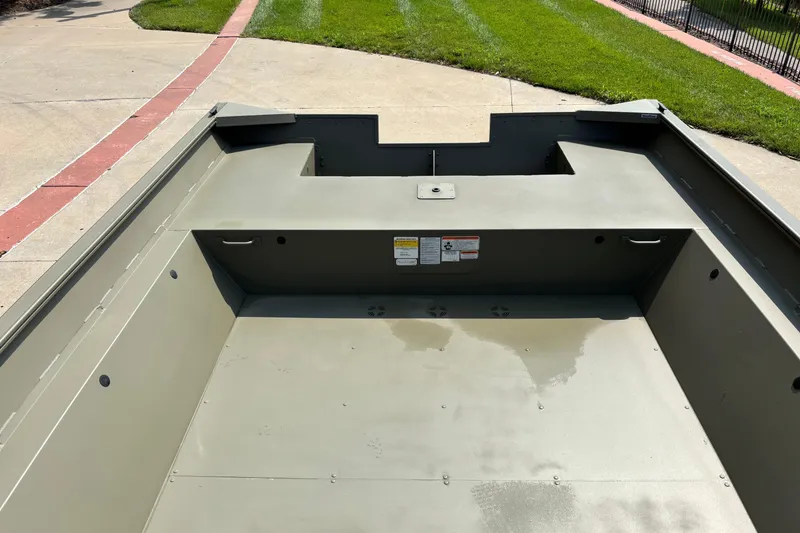 Slide: The Image of 2026 Tracker Grizzly 2072 Utility boat interior, showcasing spacious and durable design. - 5