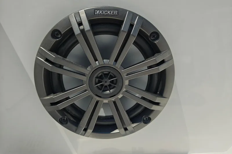 Slide: The Image of Kicker speaker on 2026 Tahoe T16, featuring sleek metallic design. - 23