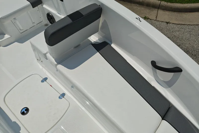 Slide: The Image of 2026 Tahoe T16 boat interior with cushioned seating and storage compartment. - 22