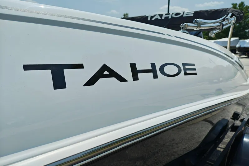 Slide: The Image of 2026 Tahoe T16 boat with sleek white exterior and bold logo. - 3