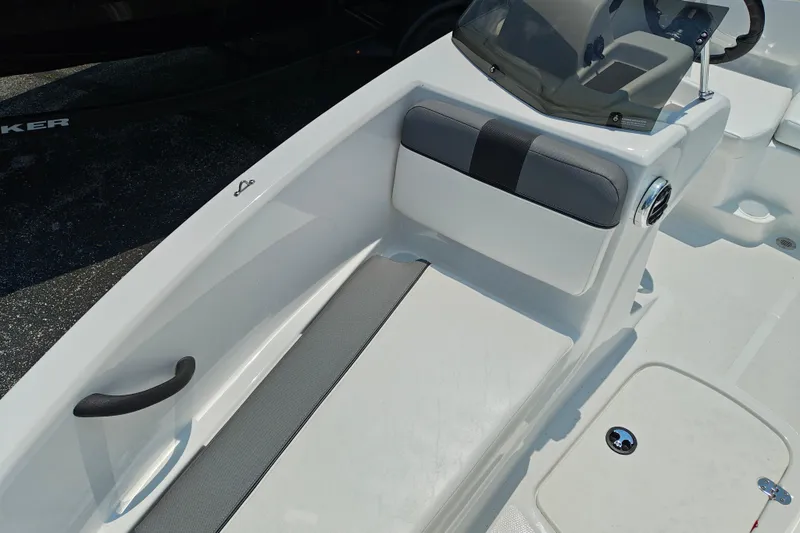 Slide: The Image of 2026 Tahoe T16 boat interior with gray seating and sleek design. - 21