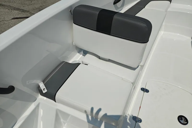 Slide: The Image of 2026 Tahoe T16 boat interior with white and black seating, showcasing modern design. - 18