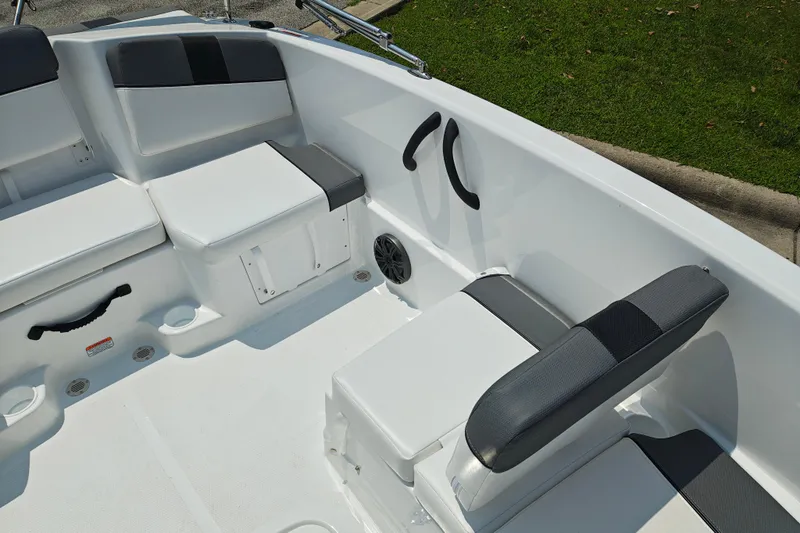 Slide: The Image of 2026 Tahoe T16 boat interior with cushioned seating and storage compartments. - 5