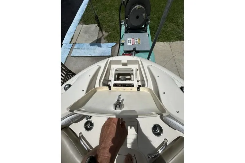 Slide: The Image of 2005 Sea Ray 270 Sundeck boat interior with open storage compartment. - 6
