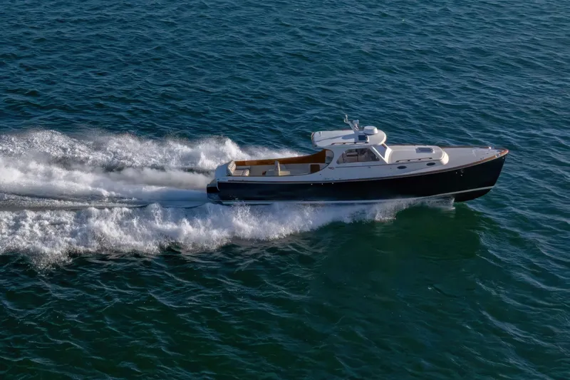 Slide: The Image of 2001 Hinckley Picnic Boat 36 Classic cruising on open water. - 7