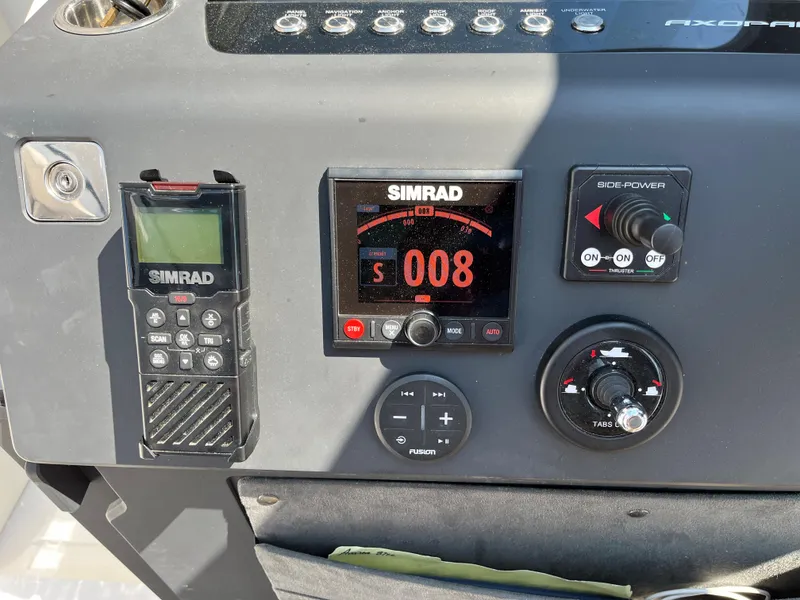 Slide: The Image of Control panel of a 2020 Axopar 37 XC boat with Simrad navigation system. - 22