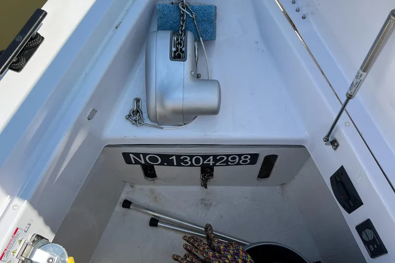Slide: The Image of Anchor compartment of 2020 Axopar 37 XC boat with registration number NO.1304298. - 32