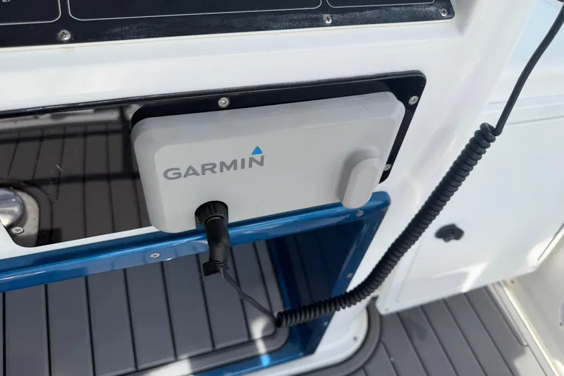 Slide: The Image of Garmin device installed on 2000 Cabo 35 Flybridge boat dashboard. - 16