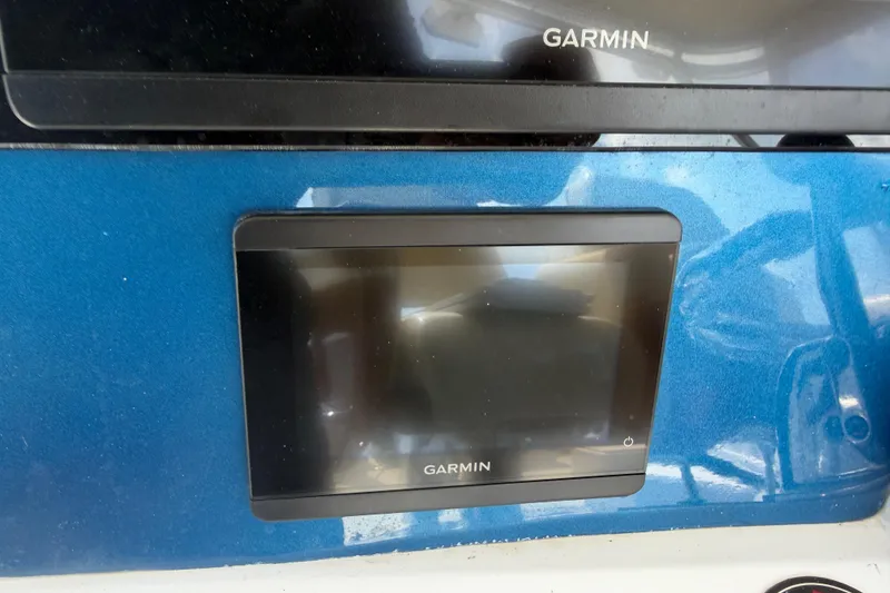 Slide: The Image of Garmin navigation display on 2000 Cabo 35 Flybridge boat dashboard. - 15