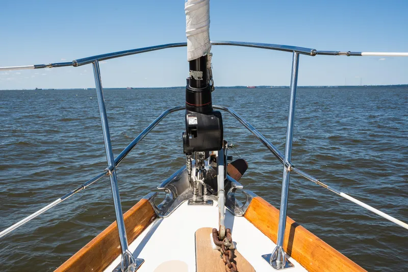 Slide: The Image of Bow view of 1985 Hinckley Sou'wester 51 sailboat on open water. - 46
