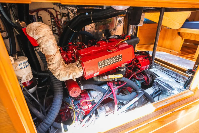 Slide: The Image of Engine room of 1985 Hinckley Sou'wester 51 sailboat with Westerbeke engine. - 32