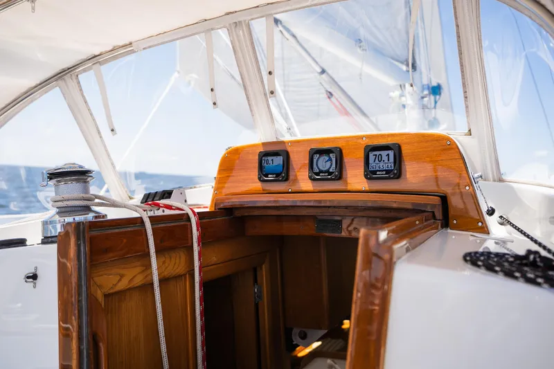 Slide: The Image of Hinckley Sou'wester 51 cockpit with navigation instruments, 1985 model, sailing on open sea. - 37