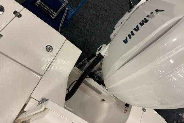 Slide: The Image of 2026 Robalo 246 Cayman boat with Yamaha outboard motor, showcasing sleek design and functionality. - 11