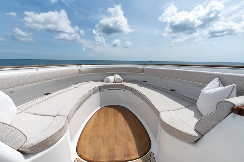Slide: The Image of Luxurious seating area on 2023 HCB 65 Estrella yacht, with ocean view and blue sky. - 20
