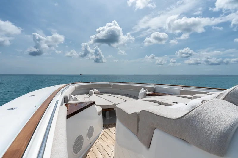 Slide: The Image of Luxurious 2023 HCB 65 Estrella yacht deck with ocean view and comfortable seating. - 23