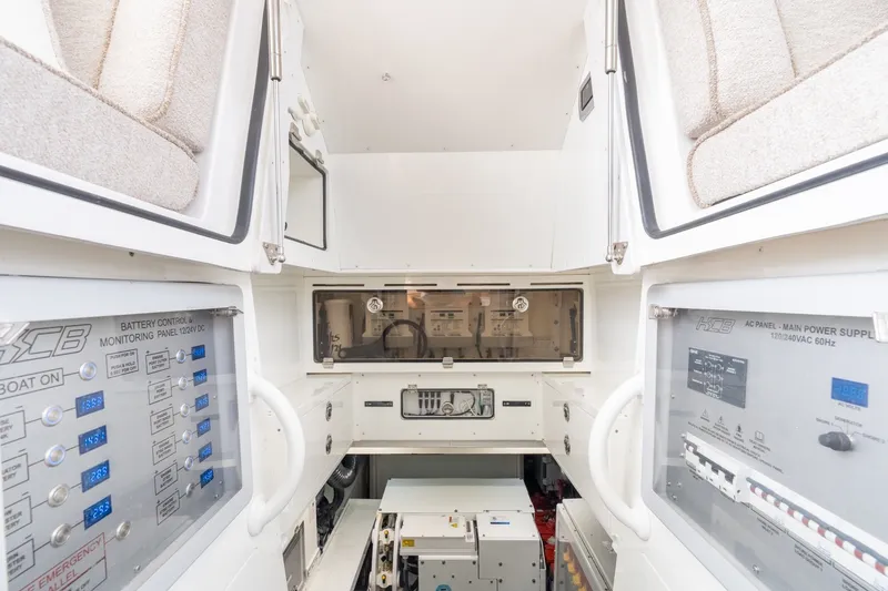 Slide: The Image of Interior view of 2023 HCB 65 Estrella's control panels and equipment storage area. - 55