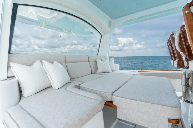 Slide: The Image of Luxurious seating area on 2023 HCB 65 Estrella yacht with ocean view. - 39