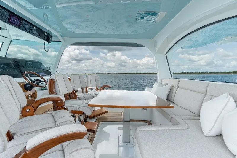 Slide: The Image of Luxurious interior of 2023 HCB 65 Estrella yacht with plush seating and scenic ocean view. - 41