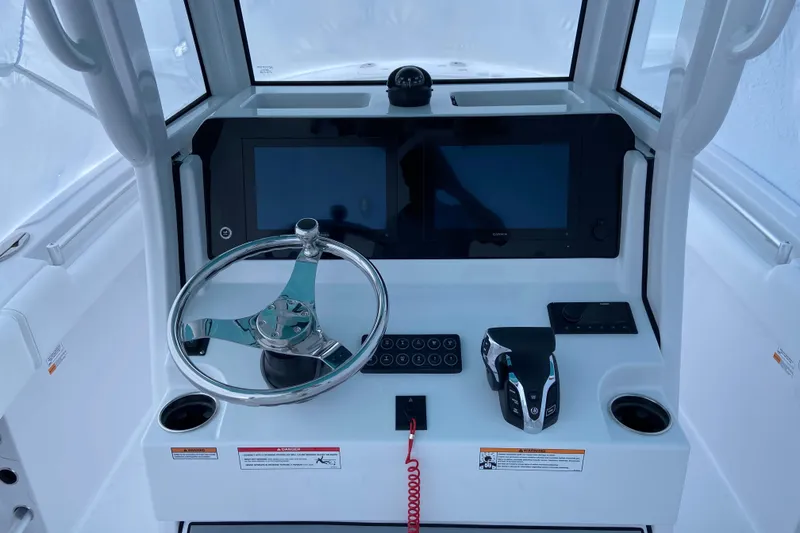 Slide: The Image of 2027 Sportsman Heritage 231 Center Console dashboard with steering wheel and digital displays. - 4