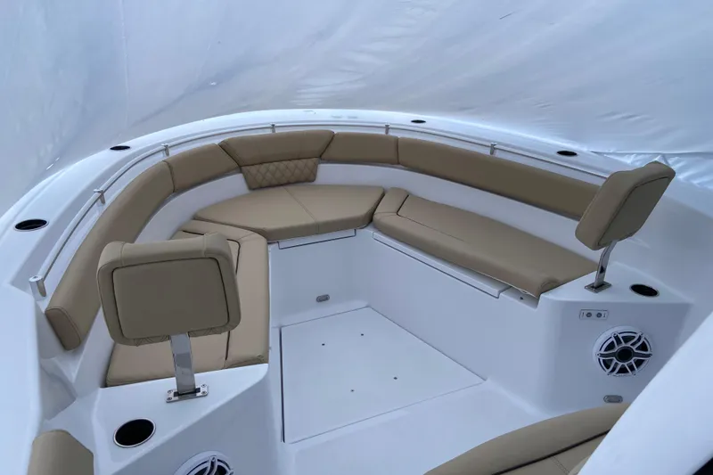 Slide: The Image of 2027 Sportsman Heritage 261 Center Console boat with spacious seating and modern design. - 8