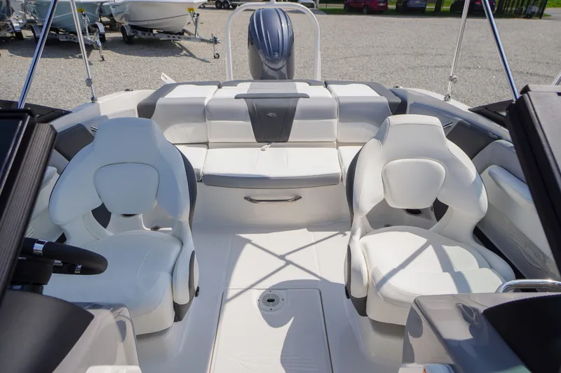 Slide: The Image of 2026 Chaparral 21 SSi OB boat interior with white seating and modern design. - 30
