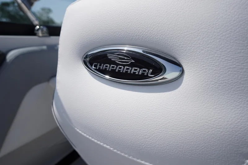 Slide: The Image of Close-up of Chaparral 21 SSi OB 2026 logo on white leather upholstery. - 42
