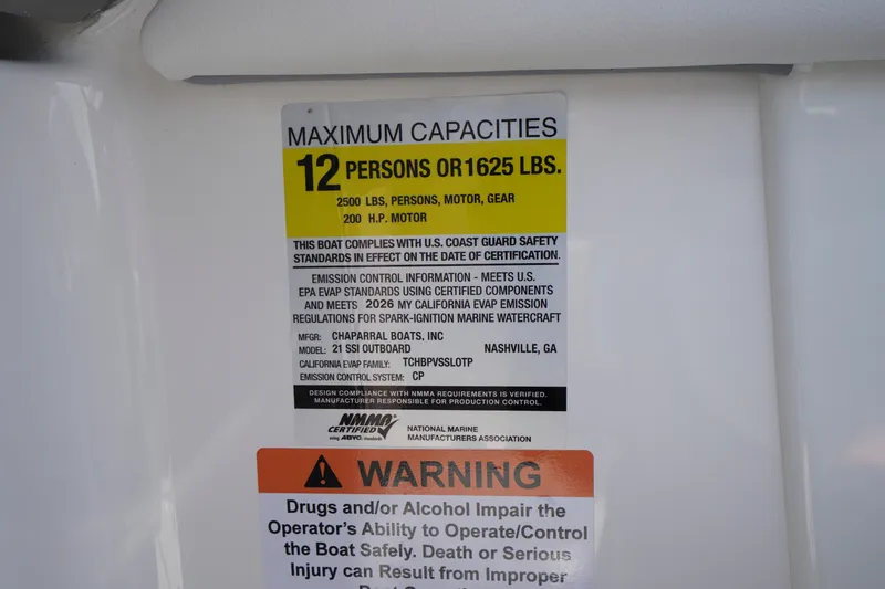 Slide: The Image of Capacity label on 2026 Chaparral 21 SSi OB boat, max 12 persons or 1625 lbs. - 22