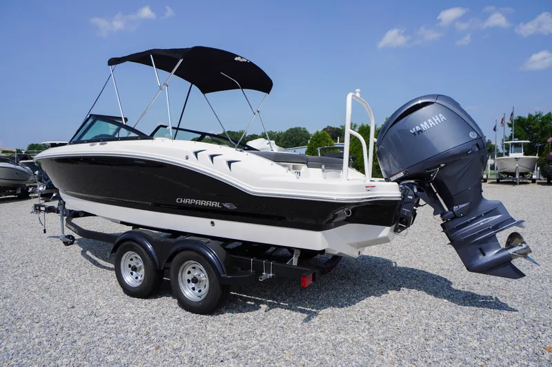 Slide: The Image of 2026 Chaparral 21 SSi OB boat with Yamaha outboard motor on trailer. - 58