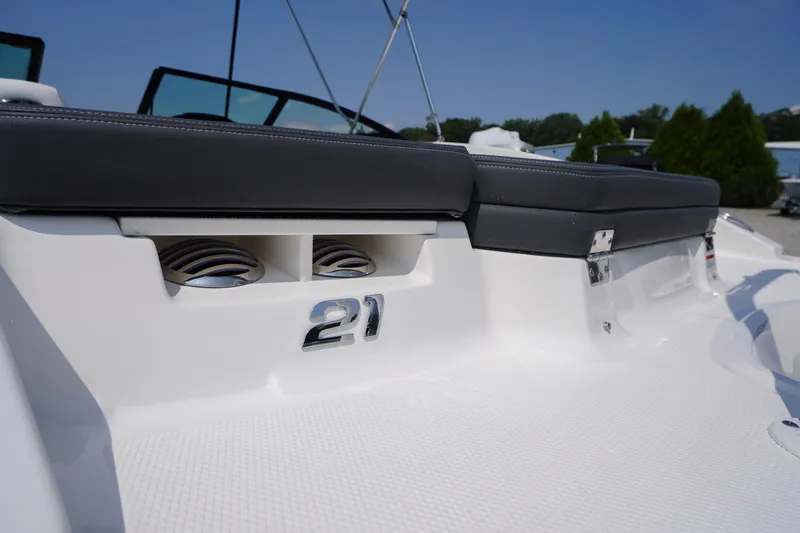 Slide: The Image of 2026 Chaparral 21 SSi OB boat interior with sleek seating and modern design elements. - 46