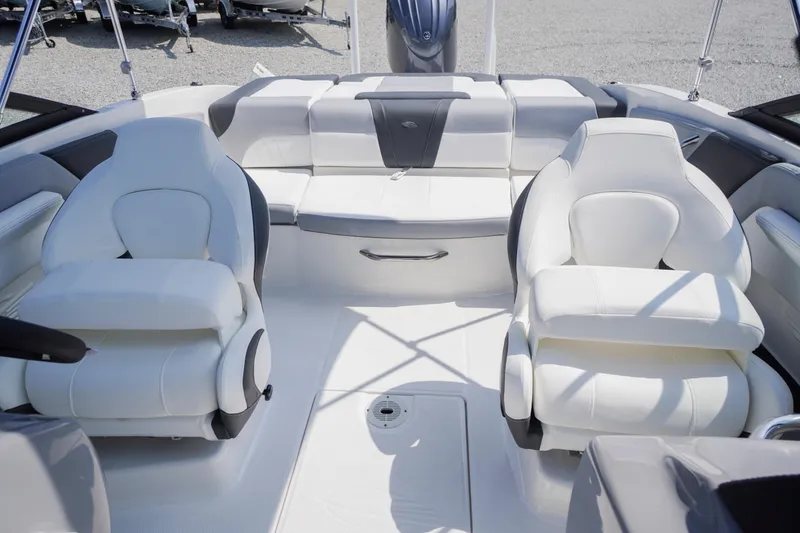 Slide: The Image of 2026 Chaparral 21 SSi OB boat interior with white seating and modern design. - 29