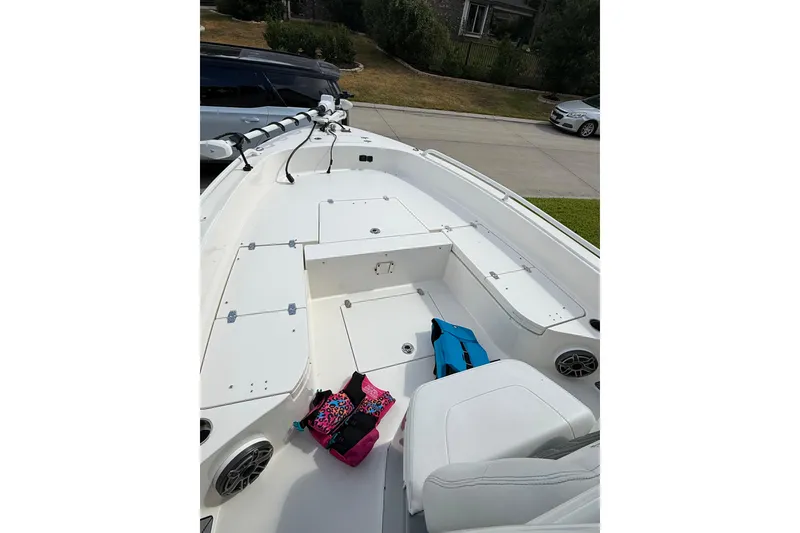 Slide: The Image of 2024 Pathfinder 2600 TRS boat interior with seating and storage compartments. - 6
