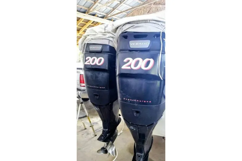Slide: The Image of Twin Mercury Verado 200 outboard engines on a 2005 Trophy 2502 Pro boat. - 3