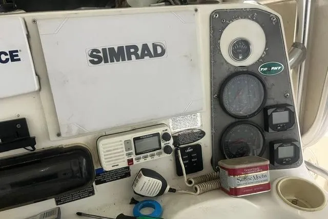 Slide: The Image of Control panel of a 2005 Trophy 2502 Pro boat with Simrad electronics. - 10