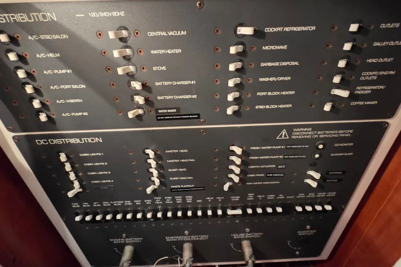 Slide: The Image of Electrical control panel on a 2004 Tiara Yachts 4400 Sovran, showcasing various switches and functions. - 43