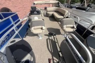 Slide: The Image of 2023 Sun Tracker Bass Buggy 18 DLX pontoon boat with spacious seating and modern design. - 4