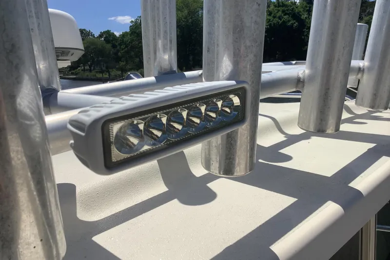 Slide: The Image of LED light bar on 2012 Parker 2520 XL Sport Cabin boat, with rod holders. - 6