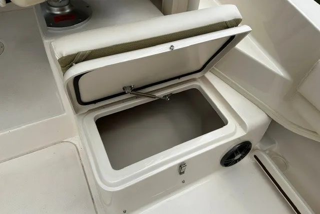 Slide: The Image of Open storage compartment on 2025 Grady-White Gulfstream 232 boat interior. - 22