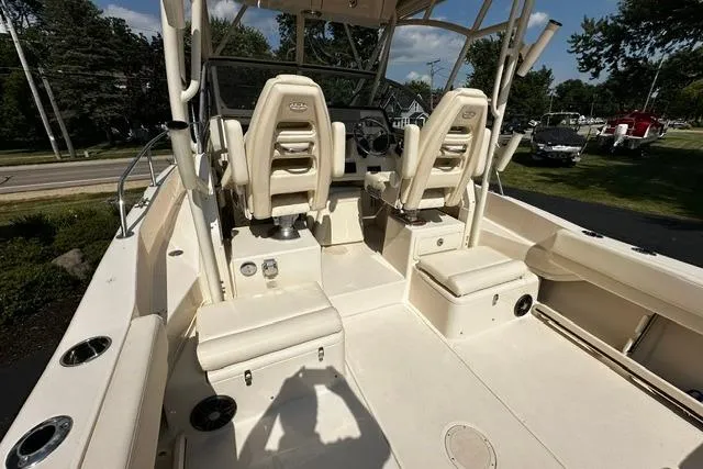 Slide: The Image of 2025 Grady-White Gulfstream 232 boat interior with dual seats and spacious deck. - 13