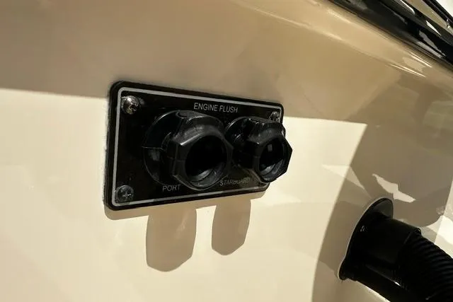Slide: The Image of Engine flush ports on 2025 Grady-White Gulfstream 232 boat. - 12