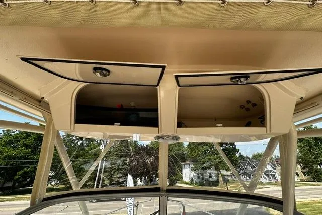 Slide: The Image of 2025 Grady-White Gulfstream 232 boat interior storage compartments, showcasing sleek design and functionality. - 35