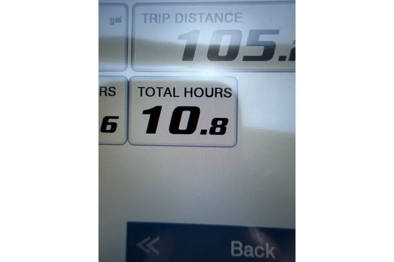 Slide: The Image of Display screen showing 105.2 trip distance and 10.8 total hours for 2024 Key West 1720 Center Console. - 17
