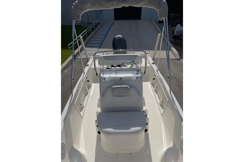 Slide: The Image of 2024 Key West 1720 Center Console boat with sleek design and spacious seating. - 12