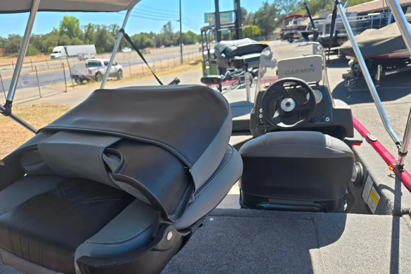 Slide: The Image of 2021 Tracker Bass Tracker Classic XL boat interior with Garmin navigation system. - 52