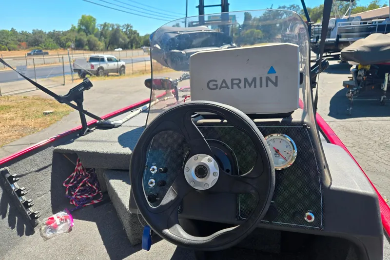 Slide: The Image of 2021 Tracker Bass Tracker Classic XL boat dashboard with Garmin GPS and RPM gauge. - 50